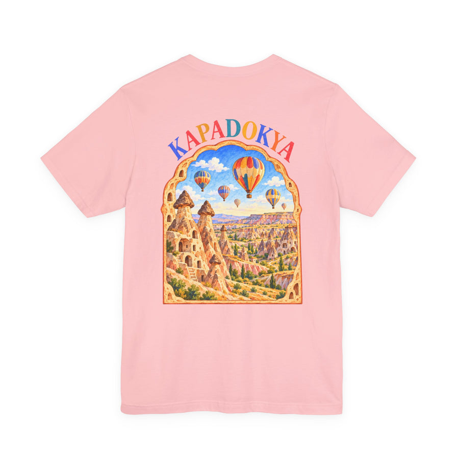 Rose – T-shirt unisexe Kapadokya, vue de dos avec la grande illustration Kapadokya et ses montgolfières